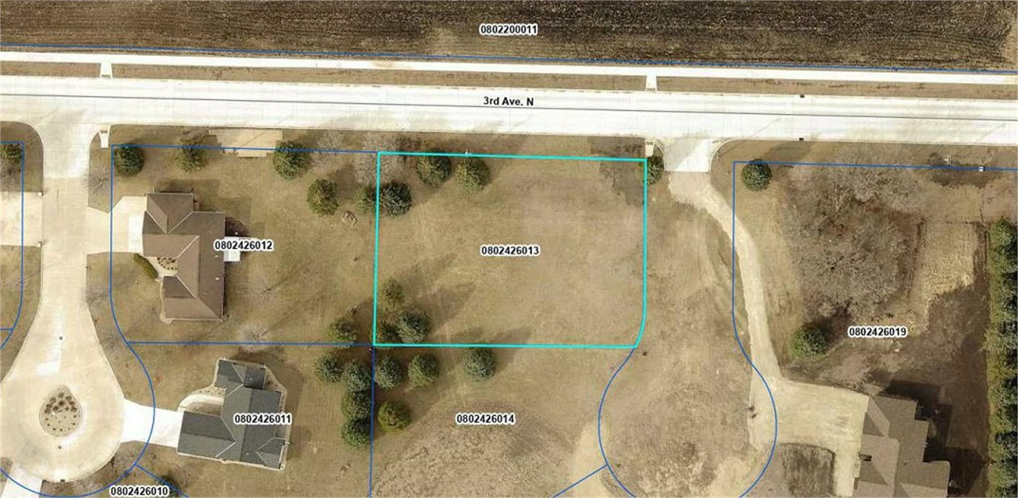 Aerial view of Lot 7 with the parcel outlined in the North Oaks subdivision